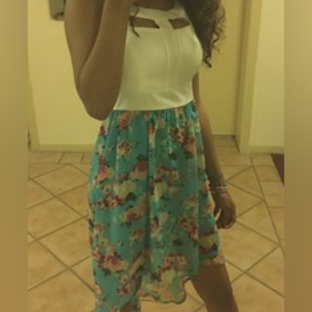 White top and blue floral bottom